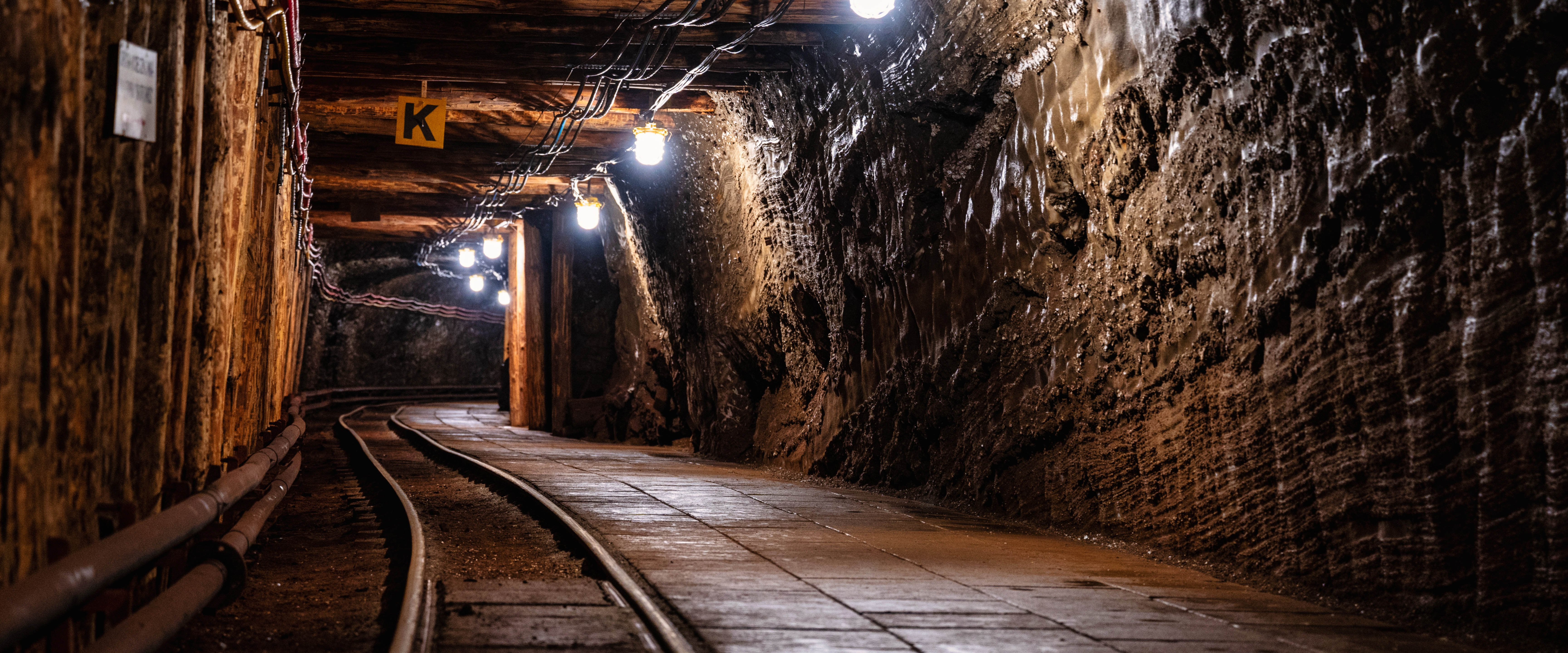 Fall protection system for mining machinery and access areas
