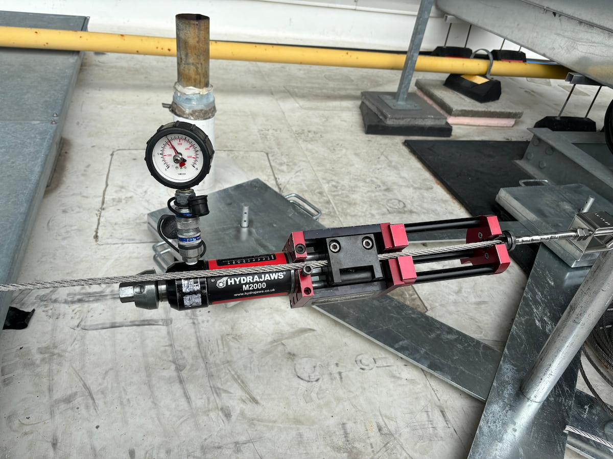 Hydrajaws tension testing equipment verifying horizontal lifeline cable performance at BMO Field during FIFA World Cup 2026 fall protection system commissioning.