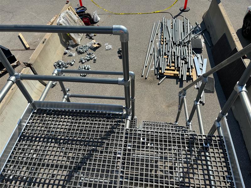 View from a Kee Platform showing anti-slip grating, guardrails, and modular construction for safe work at height.