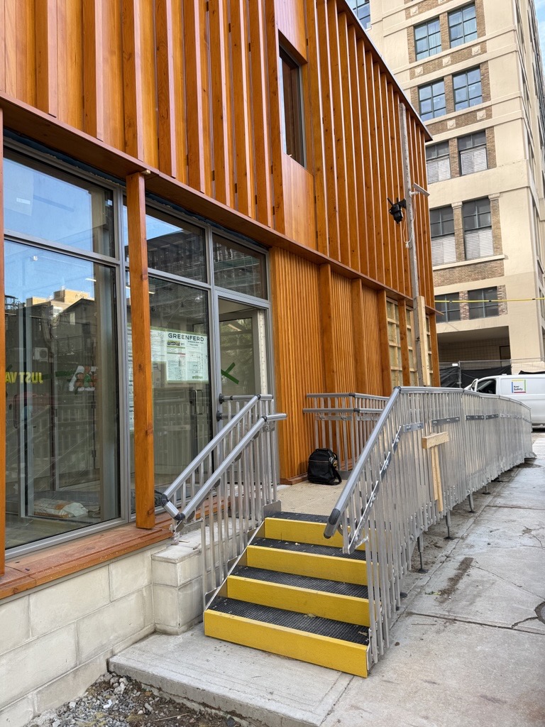Modular ramp providing accessible entry to a university facility