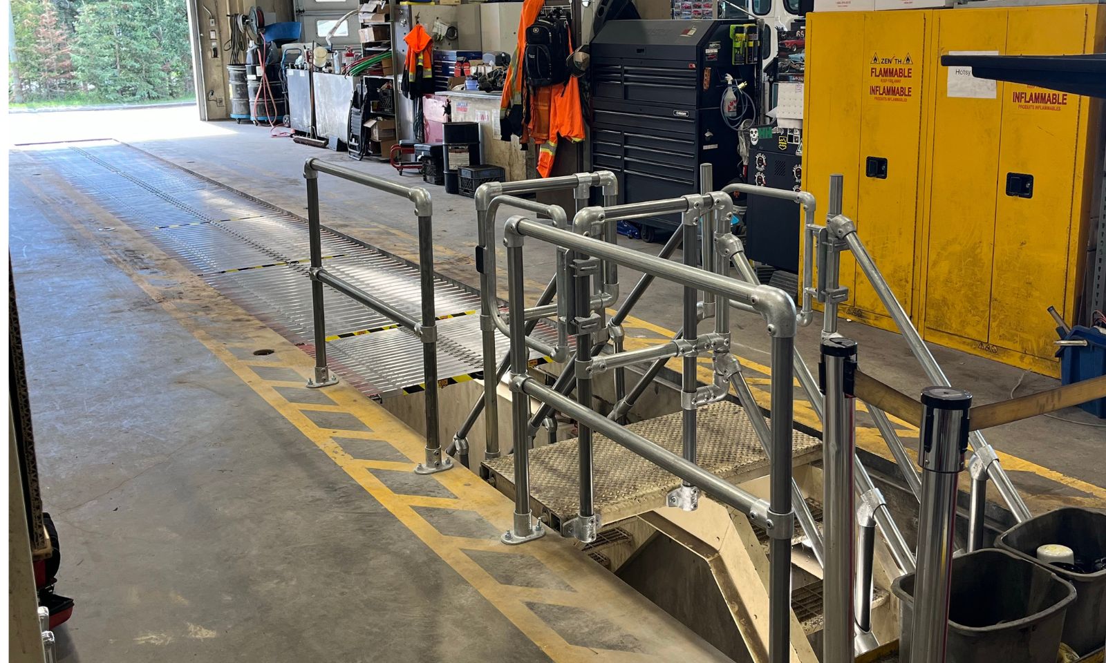 Permanent fall protection solution for open maintenance pits