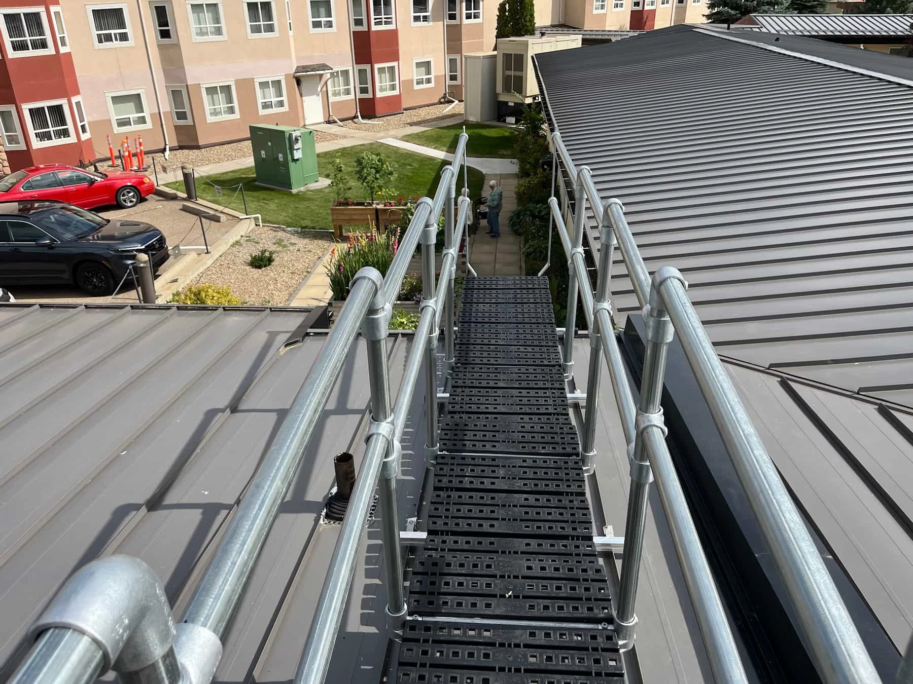 Non-penetrating rooftop walkway on metal roof Alberta