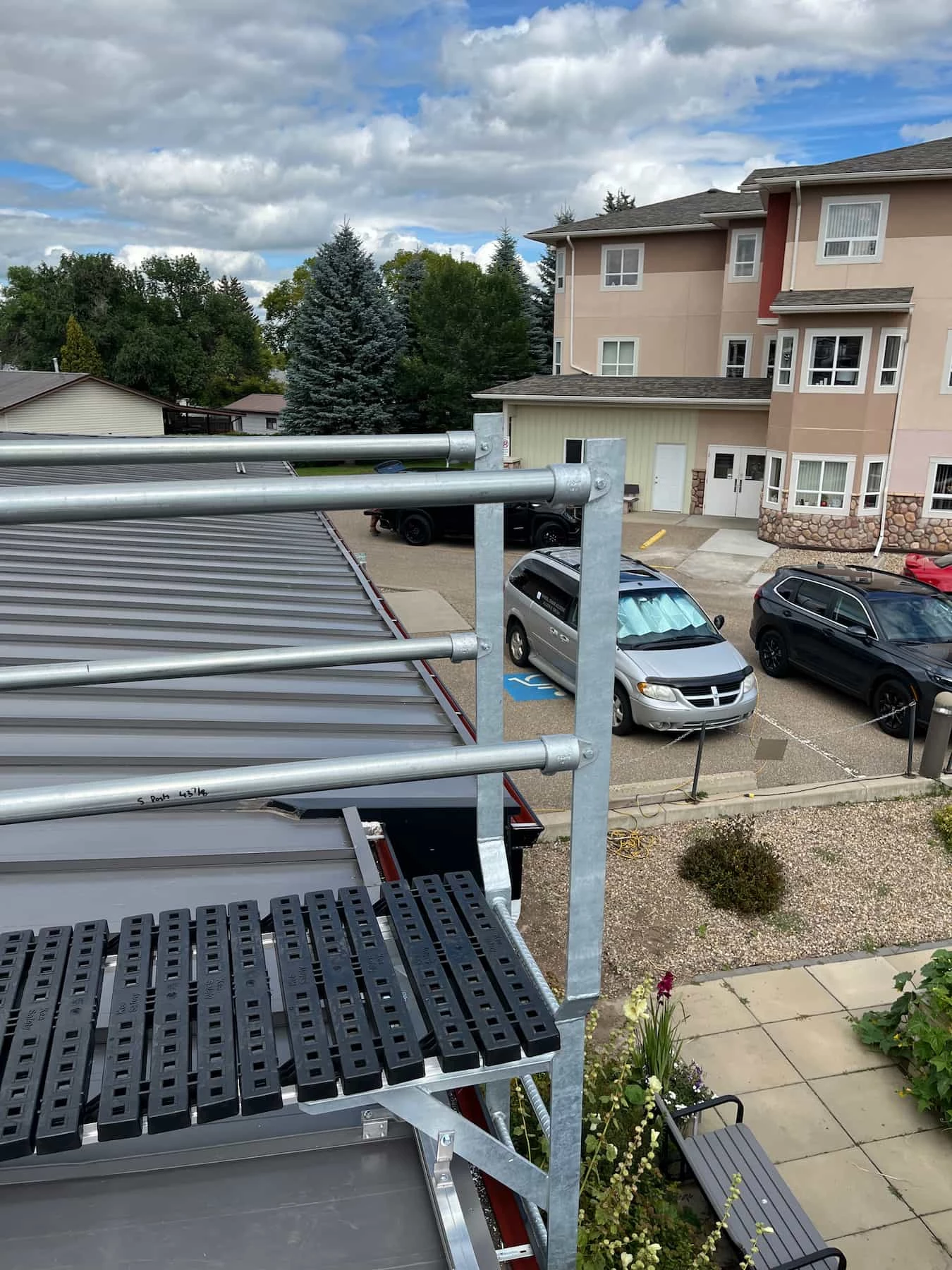 Kee Walk rooftop walkway installation in Brooks Alberta