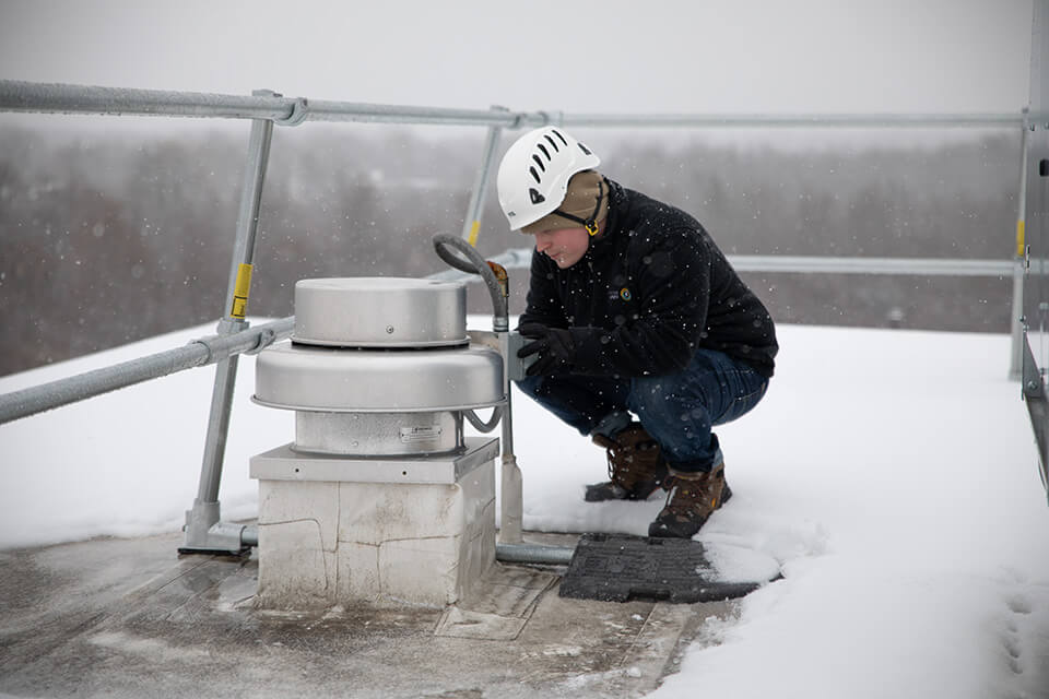 Man Working Near Edge Winter Small