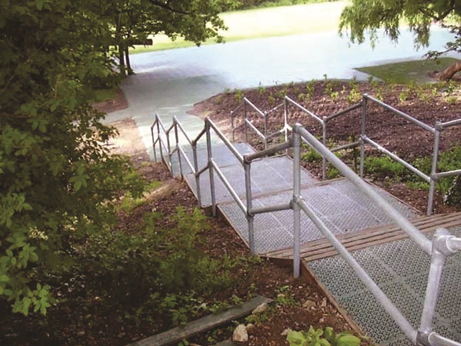 Kee Klamp safety railings on an outdoor stairway | tubular fittings