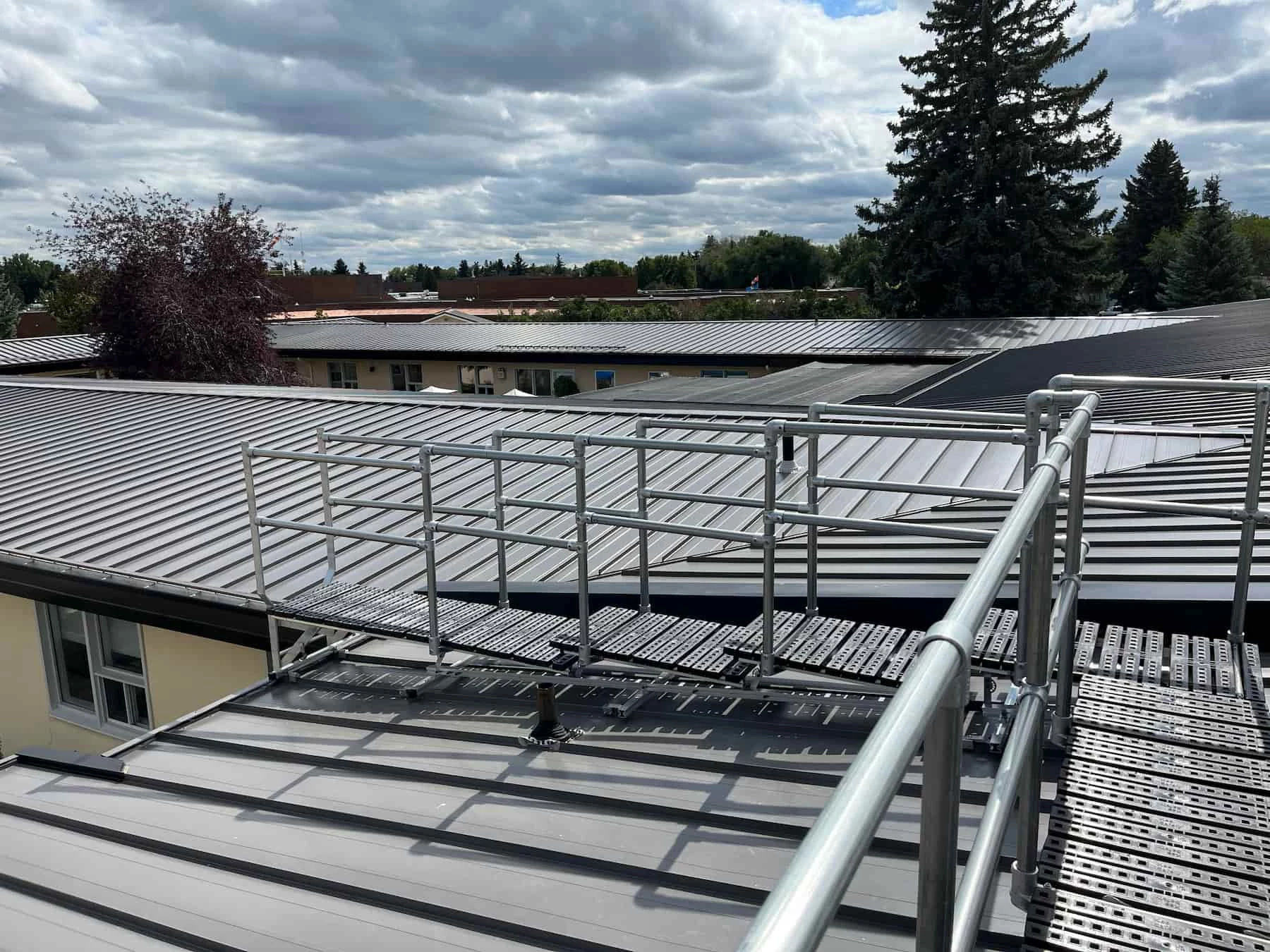 Kee Walk rooftop walkway installation in Brooks Alberta