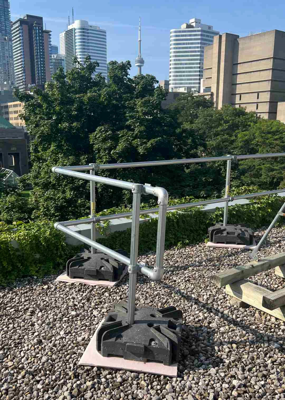 Roof Guardrail Edge protection system for narrow roof with limited walking space installed in Toronto Canada