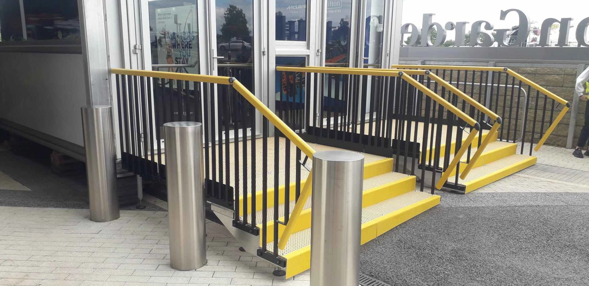 Accessibility Ramp/ Access Ramp/ RightWay Pro Access Ramp / Modular Ramp/ ACA-compliant commercial ramp at a public building entrance in Canada / Non-residential accessibility ramp for Canadian office access