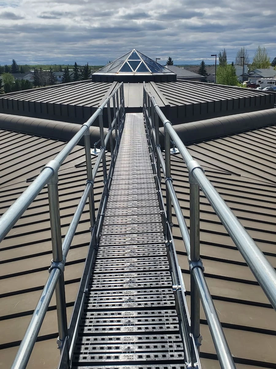 Installation of Kee Step rooftop crossover in Alberta for routine HVAC equipment servicing